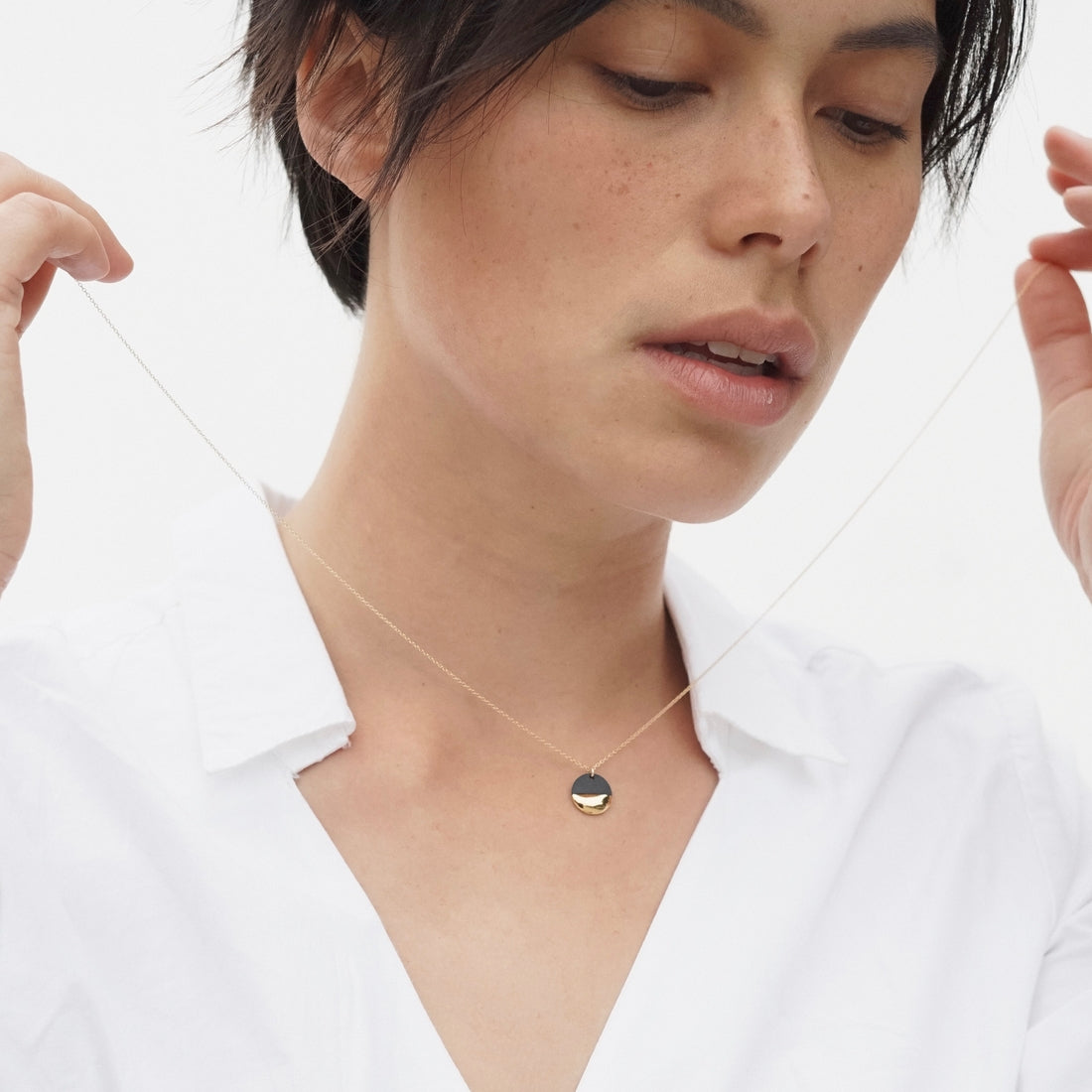 Hand crafted necklace image with model.